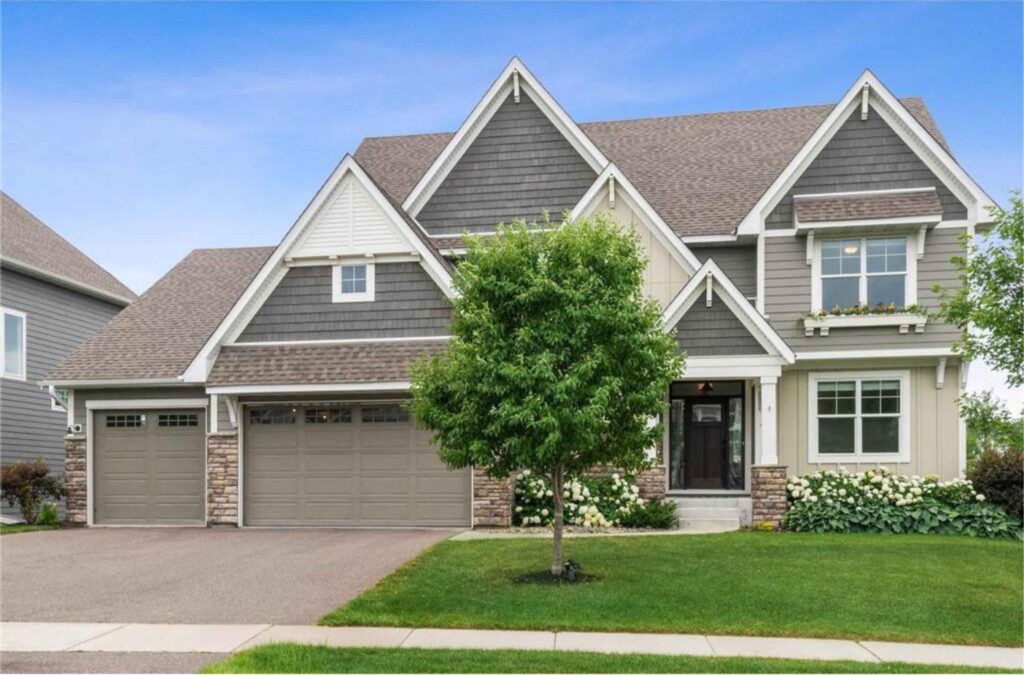 Two-story residential home with attached garage in Minnesota Twin Cities suburb