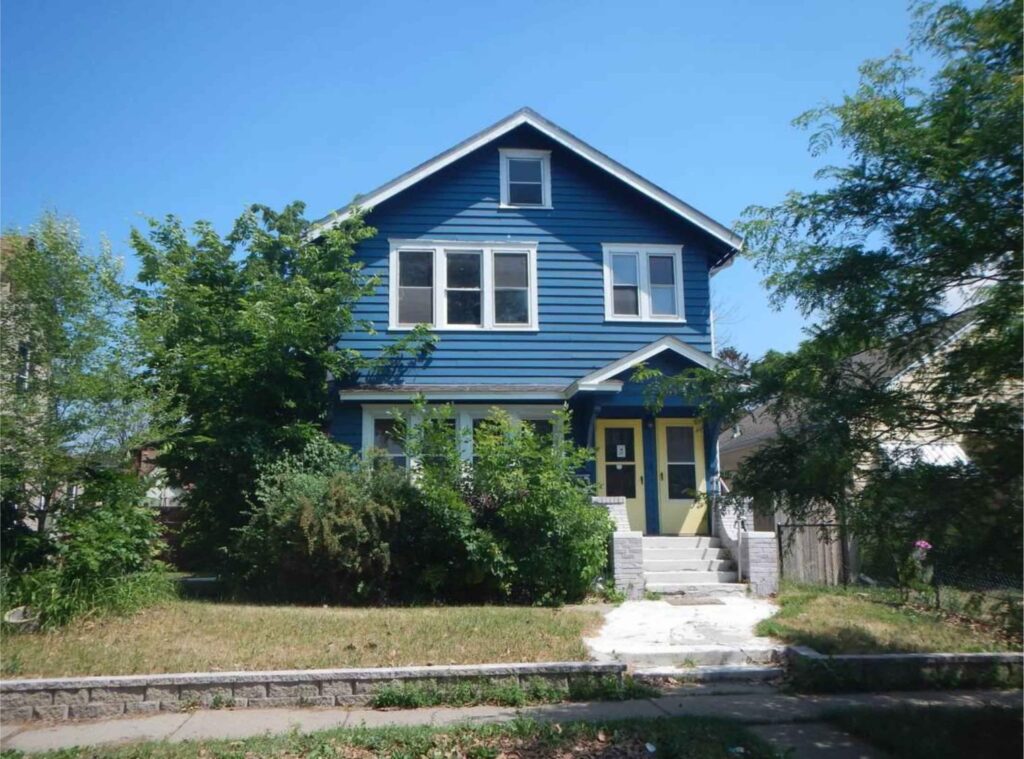 Blue two-story craftsman home residential appraisal Twin Cities