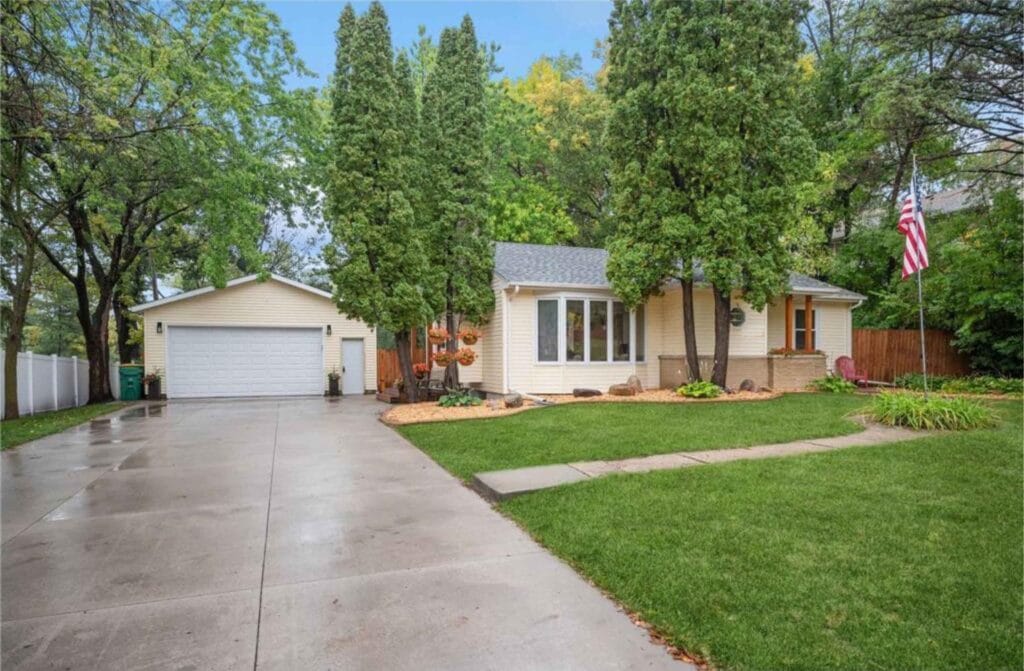 Single-story ranch home with landscaped yard in Minnesota