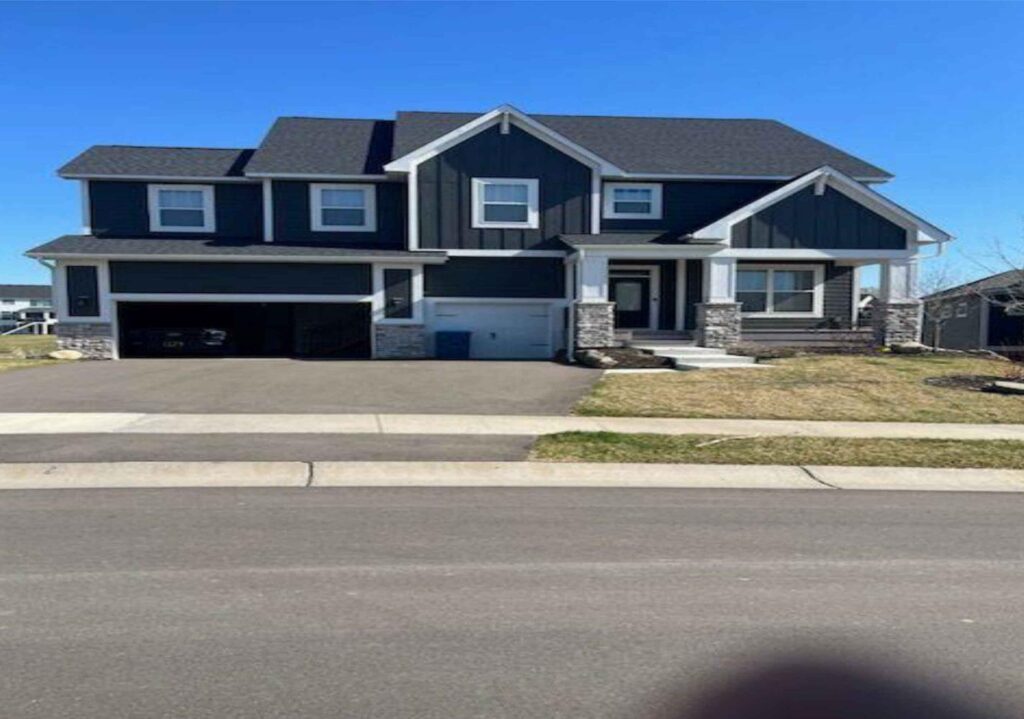 Modern executive home with dark siding property appraisal Minnesota